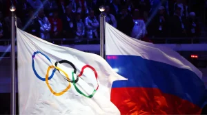 Прапори МОК та Росії на Олімпійських іграх