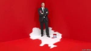 Обкладинка The Economist: чоловік у костюмі на контурі України з червоною фарбою